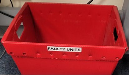 Red bin labelled Faulty Units